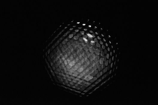 Macro photography of the holes from a speaker's mesh, background