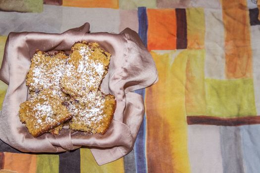 Oatmeal and walnut cookies on colorful surface