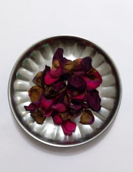 rose petals on a steel plate