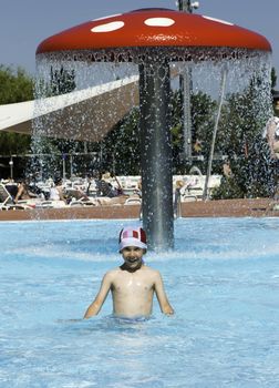 Children in swimming pool. Atractions