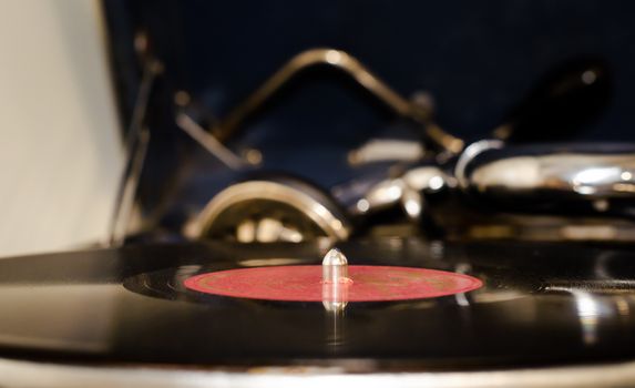 vinyl disk on a background of a gramophone
