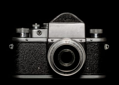 vintage camera on black background closeup