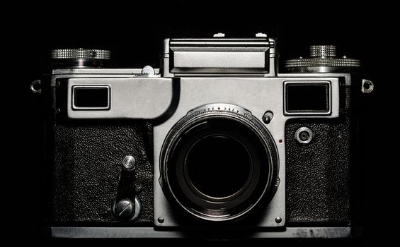 vintage camera on black background closeup