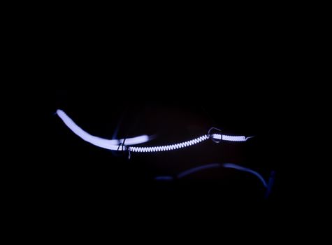 glowing spiral in the dark close up