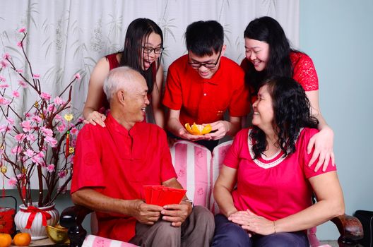 Asian family celebrating chinese new year