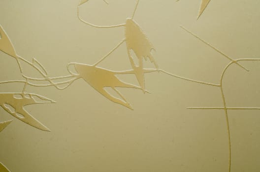 beige abstract drawing closeup