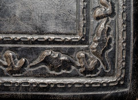 fragment of leather cover of an old book macro closeup