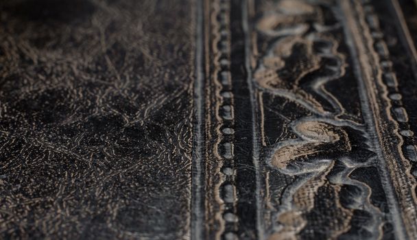 fragment of leather cover of an old book macro closeup