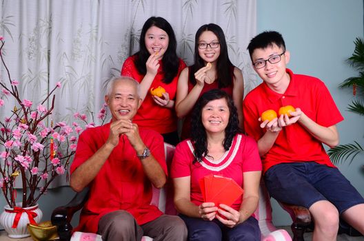 Asian family celebrating chinese new year