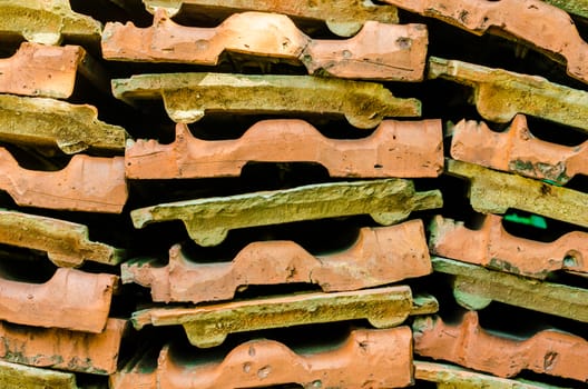 texture of clay tiles stacked in rows
