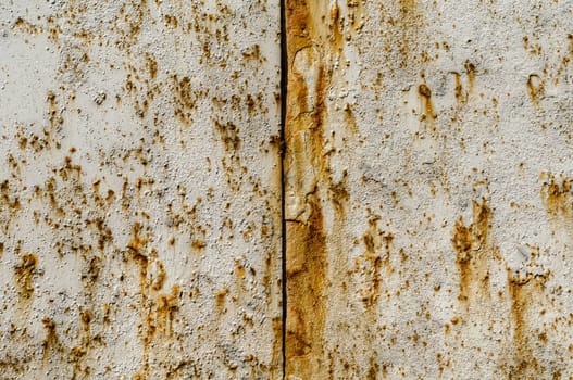 texture of a gray painted metal surface with rust