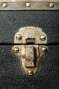 Lock of an old travel suitcase. Close up lock