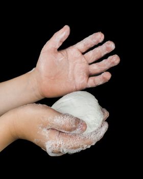 Isolated lathered hands and soap