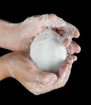 Isolated lathered hands and soap