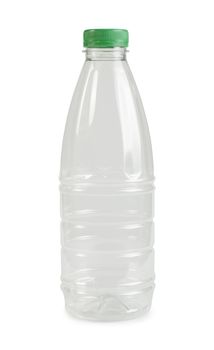 Empty transparent plastic bottle. White isolated. Green cap