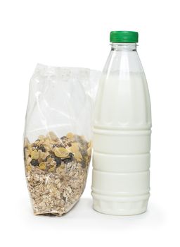 Muesli breakfast in package and bottle milk. White isolated