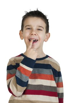 Child shows his tooth. White isolated studo shot