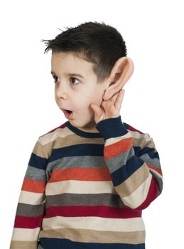 Child listening with ear. White isolated studio shot