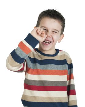 Child pick his nose. Studio shot