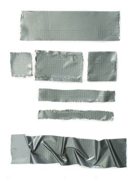 Set of torn gray masking Scotch tape isolated on white