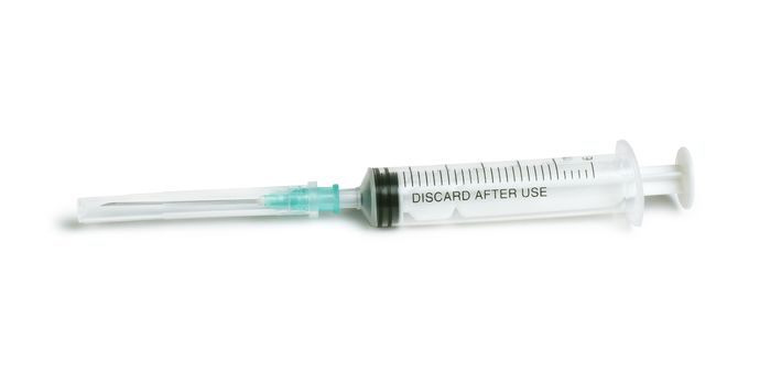 Medical syringe white isolated studio shot