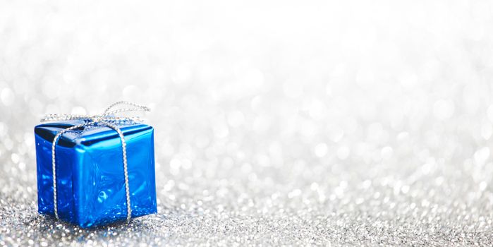 Decorative holiday Gift box on bright shiny background