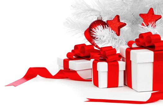 White christmas tree and presents isolated on white background
