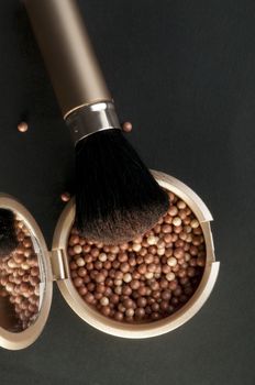 Make up Brush and pearls in a box