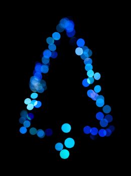 Christmas tree made ​​of bokeh lights.Blue colors