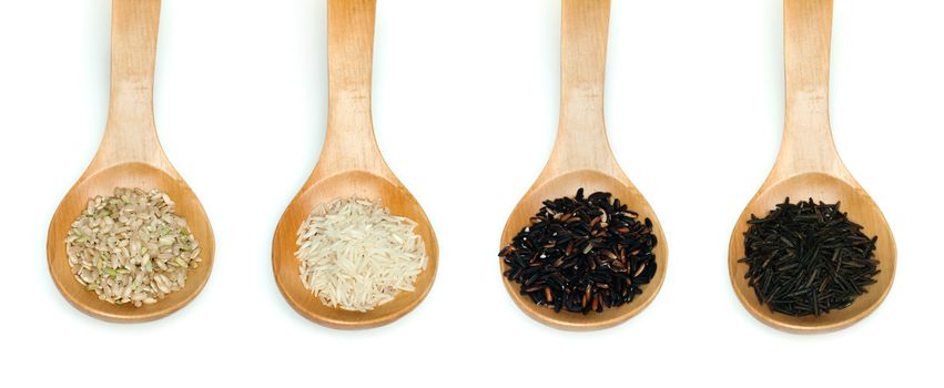 Rice integral, basmati, Wild rice and black rice in wooden spoon on white background