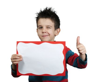 Little boy showing okay symbol. Holding white board.