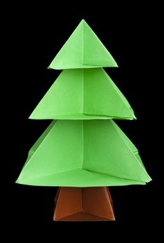 Christmas tree made of paper. Origami evergreen tree