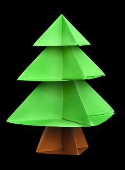 Christmas tree made of paper. Origami evergreen tree