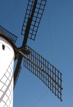White ancient windmill. Close up fin