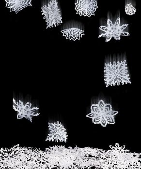 Origami isolated falling snowflakes. Paper made