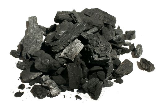 Natural charcoal close up. White isolated