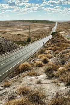 Asphalt road and white line marking. Close up low viewpoint.