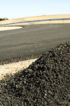 Asphalt and asphalting the road. Close up