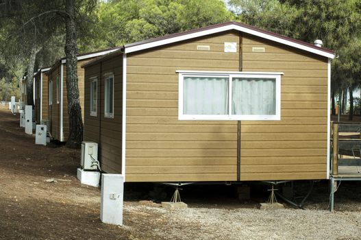 Mobile homes, brown bungalow in a camping.