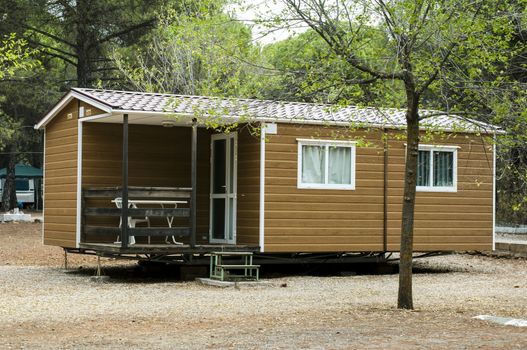 Mobile homes, brown bungalow in a camping.