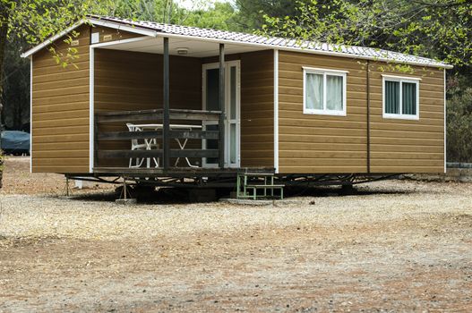 Mobile homes, brown bungalow in a camping.