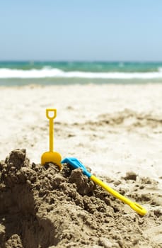 Toys in the sand on the beach