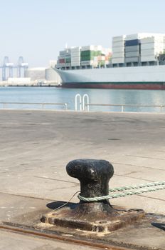 Ship moored to pier, view from bollard