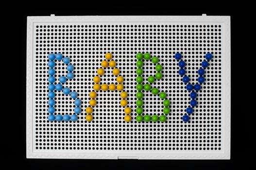 Text Baby on child mosaic. Colorful mosaic pieces