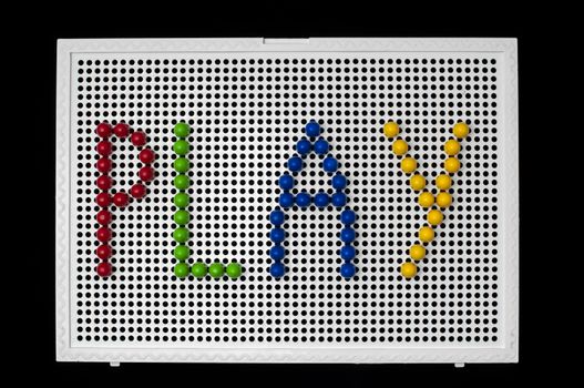 Text Play on child mosaic. Colorful mosaic pieces