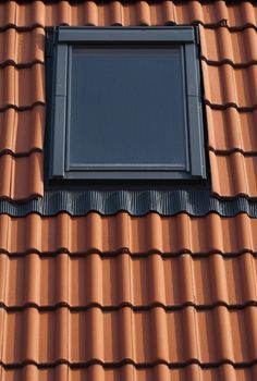 Dormer on a red tiled roof