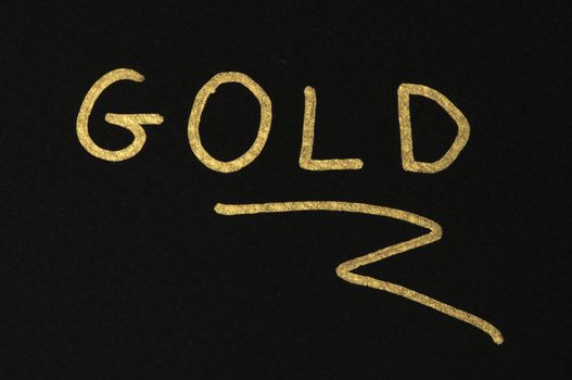 Gold conception text over black