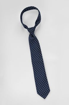 Closeup of a blue business tie isolated white background