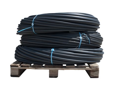 Coiled black PVC hoses. Polyethylene tubing