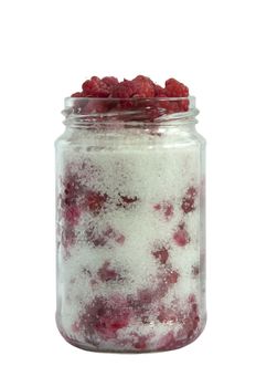 Jar with sugar and wild raspberries.White isolated